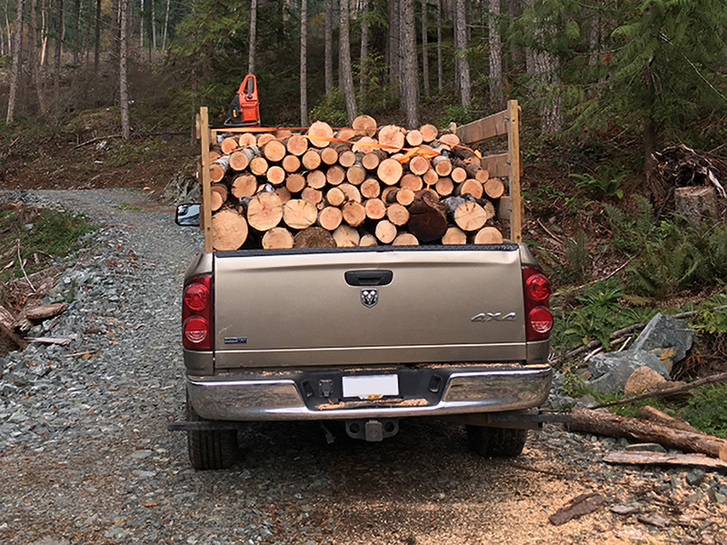 image of a truck transporting firewood